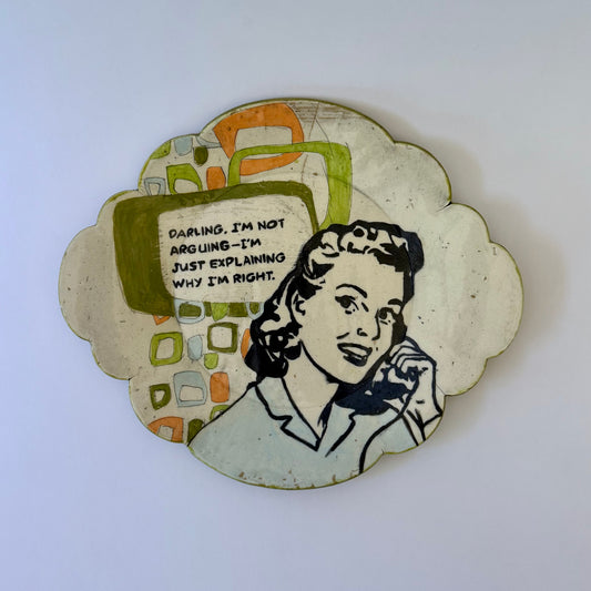 Decorative plate with a vintage-style illustration of a woman and text on a white background