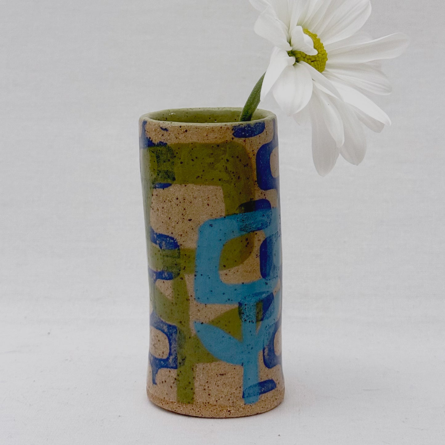 mid century inspired patterned vase with hand painted blue and green flowers