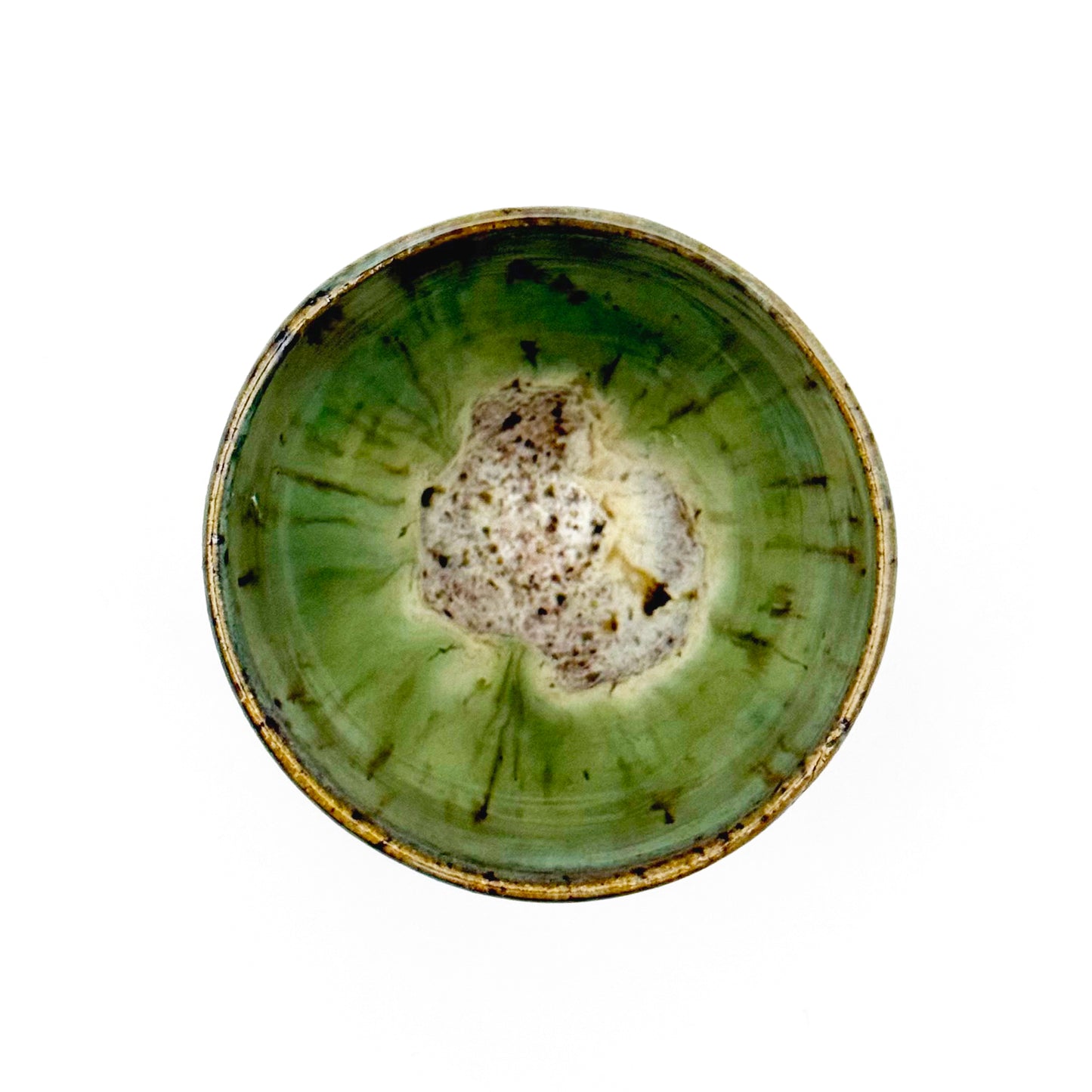 Green ceramic pot with a textured surface on a white background