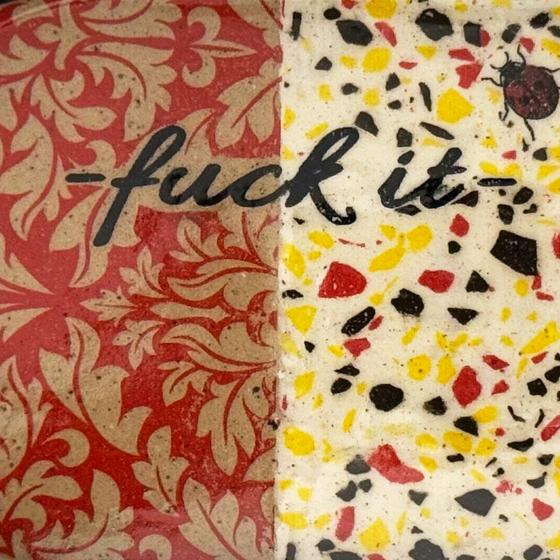 Two patterned surfaces with text, one red and ornate, the other multicolored with 'fuck it' text.