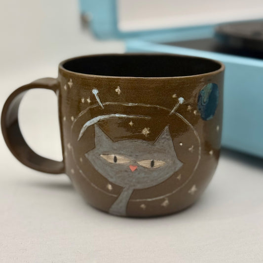 grey cat in space ceramic mug