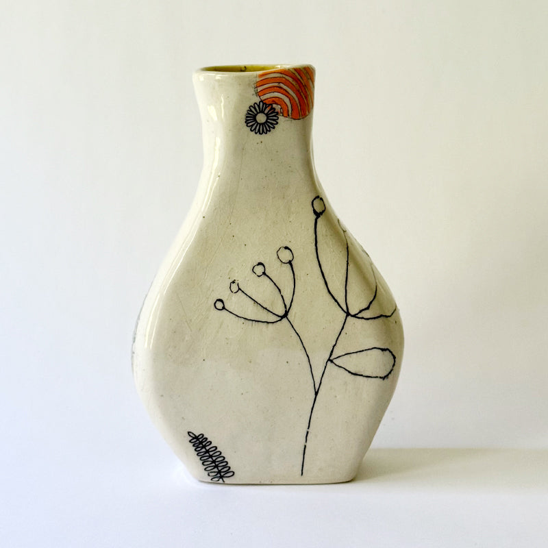 Handbuilt speckled stoneware vase with colorful mid-century-inspired monoprints featuring graphic florals, dotted orbits, and botanical motifs, finished in a glossy clear glaze.