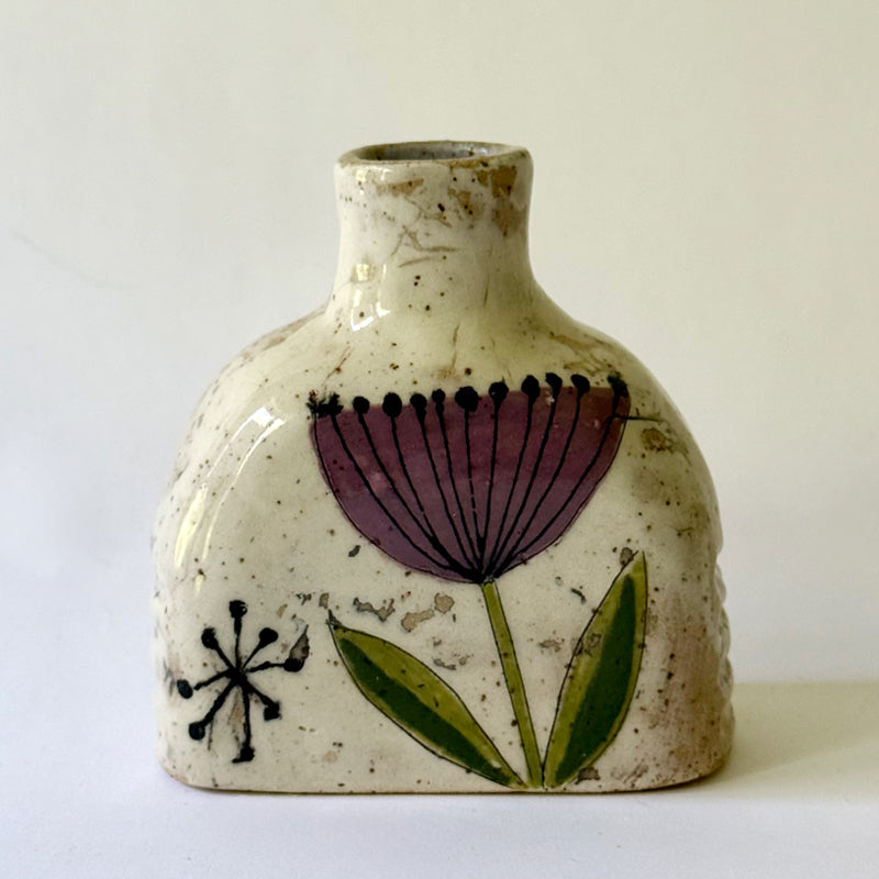 Small handbuilt speckled stoneware vase with colorful mid-century-inspired floral and botanical monoprints,
