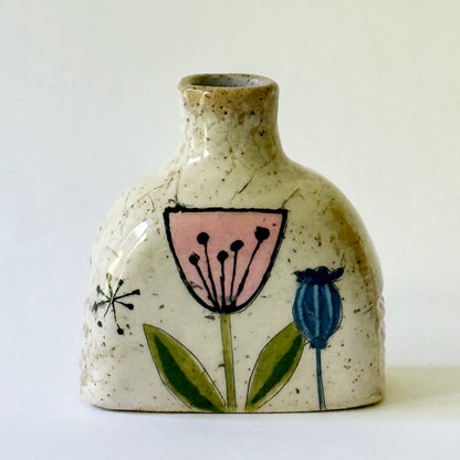 Small handbuilt speckled stoneware vase with colorful mid-century-inspired floral and botanical monoprints,