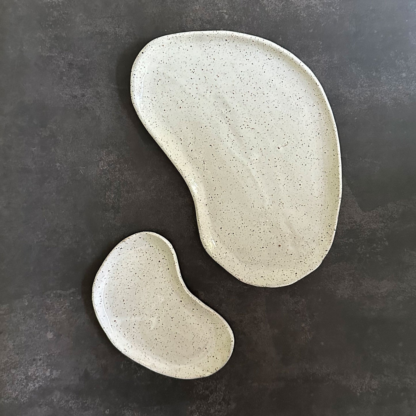 small and large lima bean shaped plates